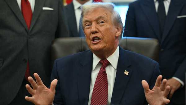 US President Donald Trump makes an announcement from the Oval Office of the White House in Washington, DC on December 3, 2025. President Trump announced weaker fuel efficiency standards for the country, as part of his agenda to lower the price of gasoline-powered cars. (Photo by ANDREW CABALLERO-REYNOLDS / AFP via Getty Images)