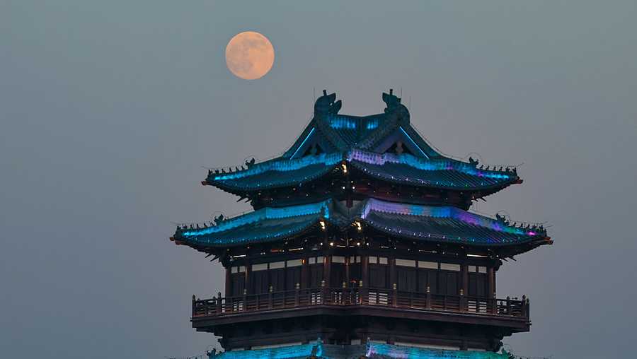 Photos show the last supermoon of the year shining in December skies