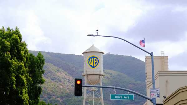 Burbank, California - October 13, 2025: The Warner Bros. Studios Water Tower with logo street view.