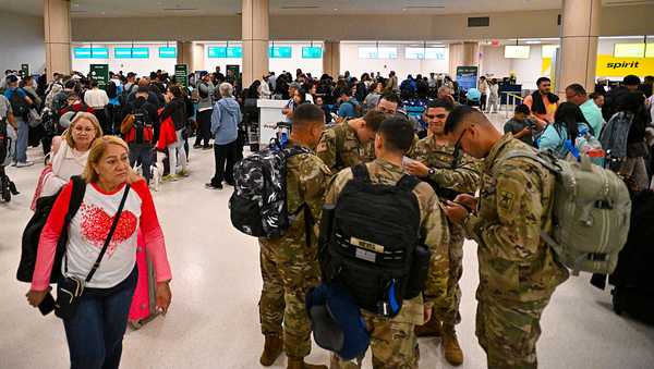 CORRECTION / Passengers wait at Luis Munoz Marin International Airport as all flights are cancelled following US military action in Venezuela, on January 3, 2026,  in Carolina, Puerto Rico. President Donald Trump said Saturday that US forces had captured Venezuelan leader Nicolas Maduro after launching a "large scale strike" on the South American country. "The United States of America has successfully carried out a large scale strike against Venezuela and its leader, President Nicolas Maduro, who has been, along with his wife, captured and flown out of the Country," Trump said on Truth Social. (Photo by Miguel J. Rodriguez Carrillo / AFP via Getty Images) / "The erroneous mention[s] appearing in the metadata of this photo by Miguel J. Rodriguez Carrillo has been modified in AFP systems in the following manner: [Luis Munoz Marin International Airport] instead of [José Aponte De la Torre Airport]. Please immediately remove the erroneous mention[s] from all your online services and delete it (them) from your servers. If you have been authorized by AFP to distribute it (them) to third parties, please ensure that the same actions are carried out by them. Failure to promptly comply with these instructions will entail liability on your part for any continued or post notification usage. Therefore we thank you very much for all your attention and prompt action. We are sorry for the inconvenience this notification may cause and remain at your disposal for any further information you may require."