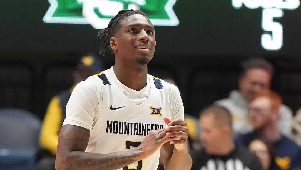 Huff scores 24 points, sparks late rally to push West Virginia past Cincinnati