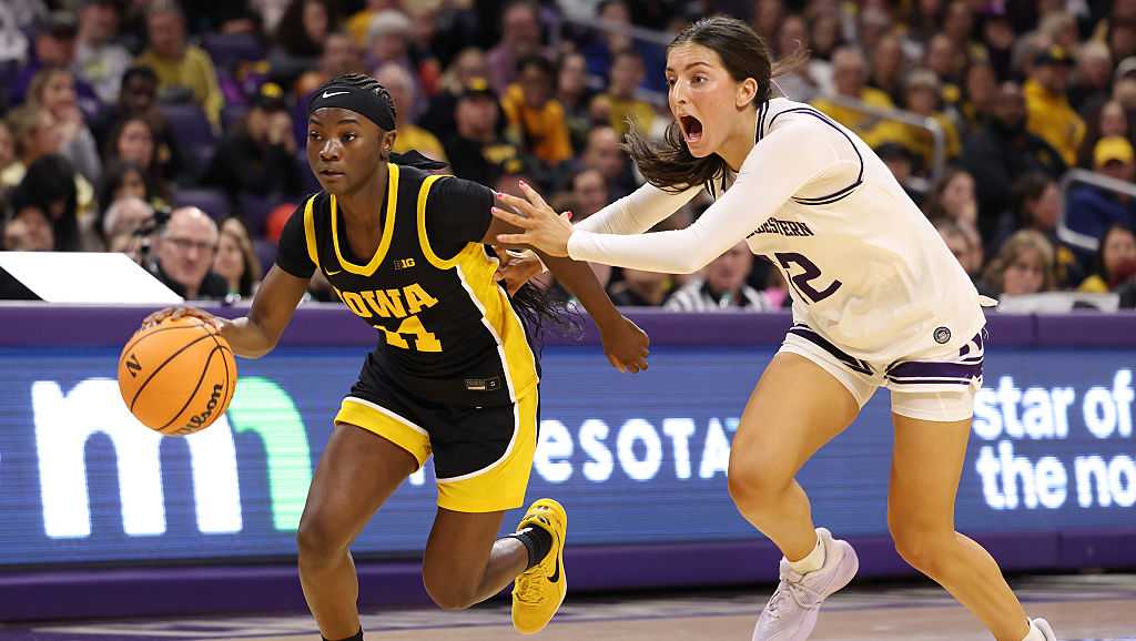 No. 14 Iowa survives late push to beat Indiana 56-53