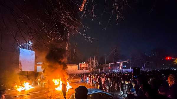Iranians gather while blocking a street during a protest in Tehran, Iran on January 9, 2026.