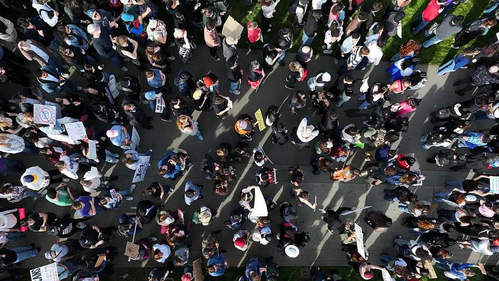 Protesters across the US call for nationwide strike against Trump's immigration policies