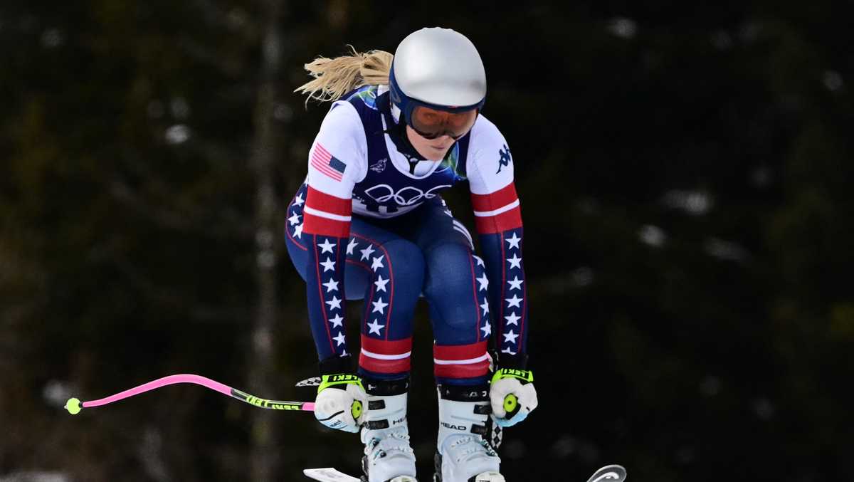Lindsey Vonn clips gate and crashes in Winter Olympic downhill, taken away by helicopter