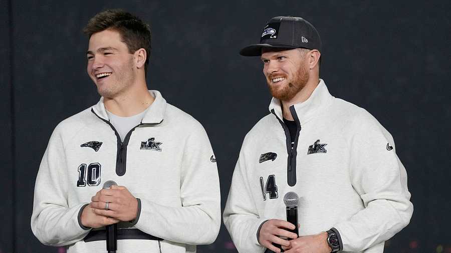 SAN JOSE, CALIFORNIA - FEBRUARY 02: Sam Darnold #14 of the Seattle Seahawks and Drake Maye #10 of the New England Patriots look on during Super Bowl LX Opening Night at San Jose McEnery Convention Center on February 02, 2026 in San Jose, California. (Photo by Thearon W. Henderson/Getty Images)