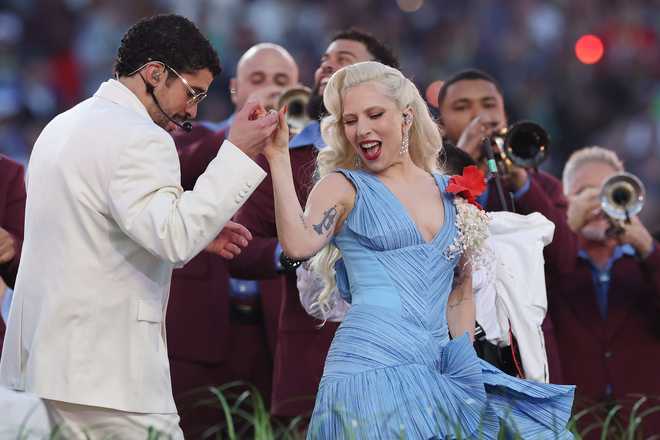 SANTA CLARA, CALIFORNIA - FEBRUARY 08: Bad Bunny and Lady Gaga perform onstage during the Apple Music Super Bowl LX Halftime Show at Levi's Stadium on February 08, 2026 in Santa Clara, California. (Photo by Kevin C. Cox/Getty Images)