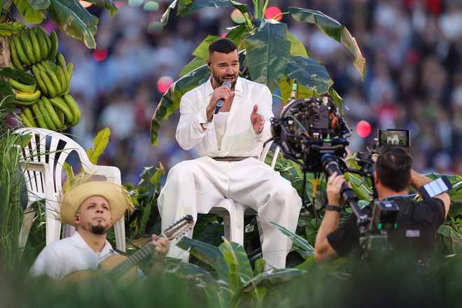 SANTA CLARA, CALIFORNIA - FEBRUARY 08: Ricky Martin performs with Bad Bunny onstage during the Apple Music Super Bowl LX Halftime Show at Levi's Stadium on February 08, 2026 in Santa Clara, California. (Photo by Ronald Martinez/Getty Images)