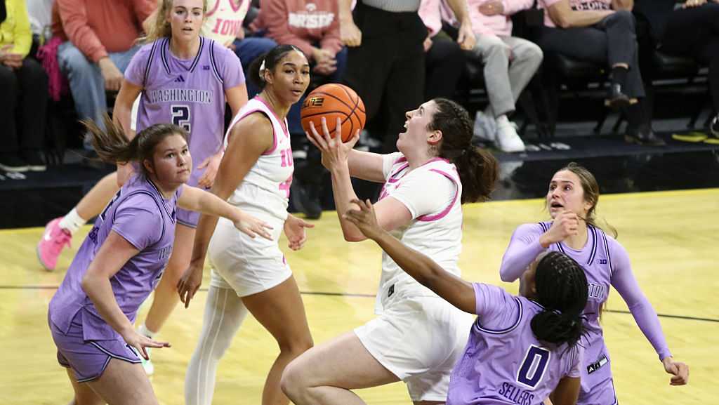 No. 13 Iowa rolls past Purdue behind Heiden’s double-double