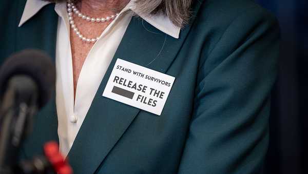 WASHINGTON, DC - FEBRUARY 24: House Minority Whip Katherine Clark (D-MA) wears a pin calling for the reals of the Epstein files during a press conference with survivors of Jeffrey Epstein ahead of President Trump's State of the Union, in Washington, DC on February 24, 2026. (Photo by Nathan Posner/Anadolu via Getty Images)