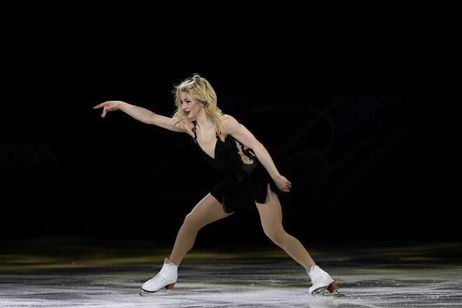 MILAN, ITALY - FEBRUARY 21: Amber Glenn of the United States performs her routine  in the Olympic Skating Exhibition Gala on day fifteen of the Milano Cortina 2026 Winter Olympic games at Milano Ice Skating Arena on February 21, 2026 in Milan, Italy.(Photo by Steve Christo/Getty Images)