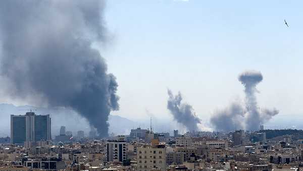 Plumes of smoke rise following reported explosions in Tehran on March 1, 2026, after Iran's supreme leader, Ayatollah Ali Khamenei, was killed a day earlier in a large U.S. and Israeli attack, prompting a new wave of retaliatory missile strikes from Iran.