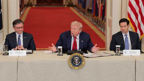 WASHINGTON, DC - MARCH 06: U.S. President Donald Trump (C) speaks as U.S. Speaker of the House Mike Johnson (R-LA) (L) and U.S. Secretary of State Marco Rubio look on during a roundtable discussion on college sports in the East Room of the White House on March 06, 2026 in Washington, DC. The Trump administration held the roundtable titled "Saving College Sports" with leaders from the Power Four conferences, media executives and former coaches. (Photo by Anna Moneymaker/Getty Images)