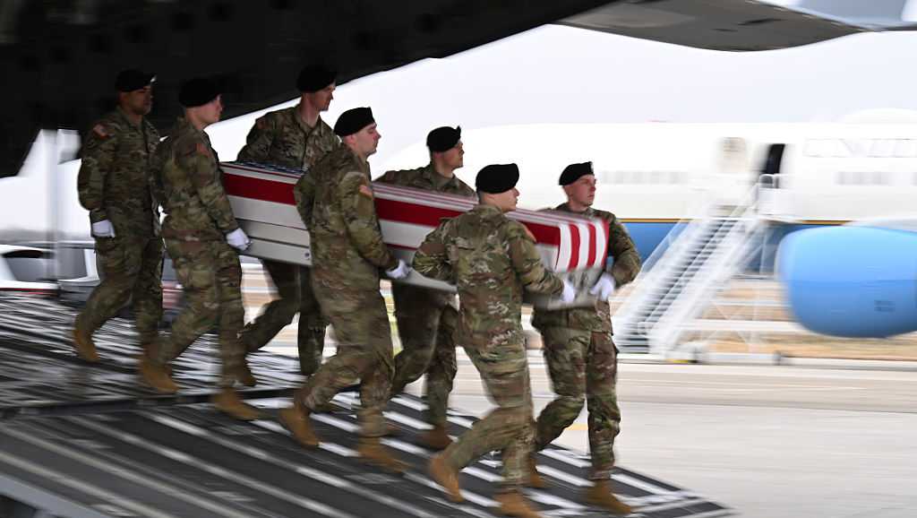 PHOTOS: Bodies of 6 slain Army reserve soldiers, including 2 Iowans, return to U.S.