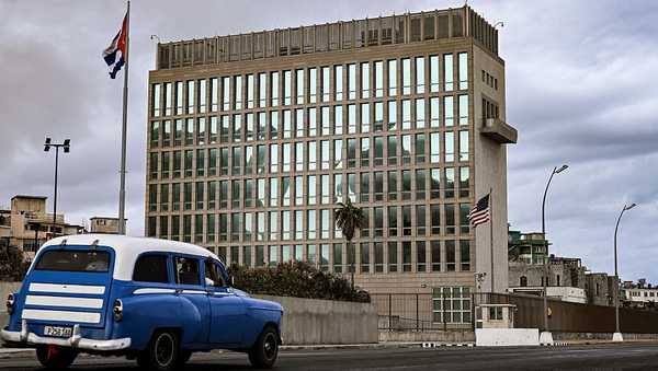 An old car is pictured in front of US embassy in Havana on March 17, 2026. Cuba scrambled on March 17, 2026, to restore power after a nationwide blackout that hit the communist-run island just as US President Donald Trump proclaimed he will "take" it over. (Photo by YAMIL LAGE / AFP via Getty Images)