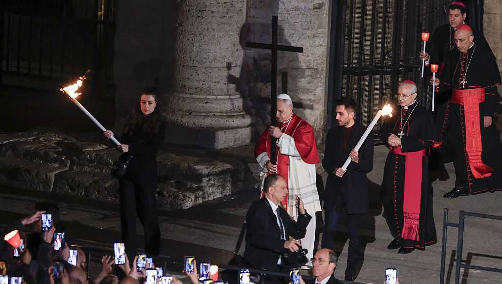 PHOTOS: Pope Leo carries cross for full Good Friday procession, the first pontiff to do so in decades