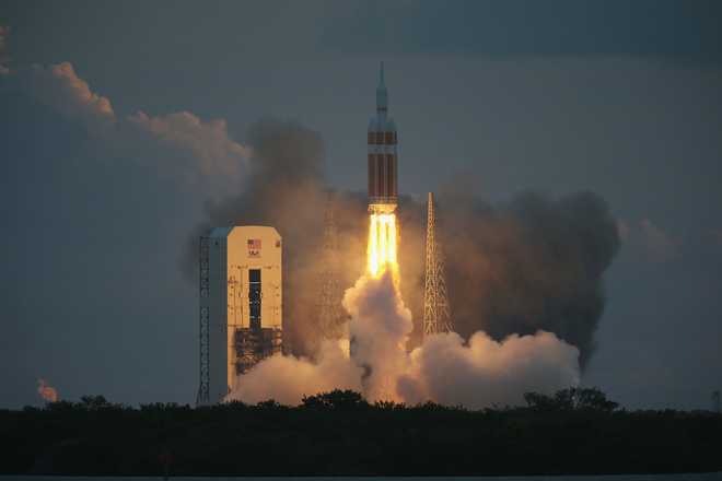 CAPE&#x20;CANAVERAL,&#x20;FL&#x20;-&#x20;DECEMBER&#x20;05&#x3A;&#x20;&#x20;The&#x20;United&#x20;Launch&#x20;Alliance&#x20;Delta&#x20;4&#x20;rocket&#x20;carrying&#x20;NASA&amp;apos&#x3B;s&#x20;first&#x20;Orion&#x20;deep&#x20;space&#x20;exploration&#x20;craft&#x20;takes&#x20;off&#x20;from&#x20;its&#x20;launchpad&#x20;on&#x20;December&#x20;5,&#x20;2014&#x20;in&#x20;Cape&#x20;Canaveral,&#x20;Florida.&#x20;&#x20;The&#x20;heavy-lift&#x20;rocket&#x20;will&#x20;boost&#x20;the&#x20;unmanned&#x20;Orion&#x20;capsule&#x20;to&#x20;an&#x20;altitude&#x20;of&#x20;3,600&#x20;miles,&#x20;and&#x20;returning&#x20;for&#x20;a&#x20;splashdown&#x20;west&#x20;of&#x20;Baja&#x20;California&#x20;after&#x20;a&#x20;four&#x20;and&#x20;half&#x20;hour&#x20;flight.&#x20;&#x20;.&#x20;&#x20;&#x28;Photo&#x20;by&#x20;Joe&#x20;Raedle&#x2F;Getty&#x20;Images&#x29;
