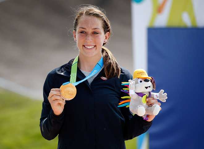 TORONTO, ON - JULY 11:  Felicia Stancil of the United States celebrates on the podium after winning the women&amp;apos;s BMX Final during the Toronto 2015 Pan Am Games at Centennial Park on July 11, 2015 in Toronto, Canada.  (Photo by Ezra Shaw/Getty Images)