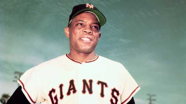 3/1955- Willie Mays of the New York Giants. Waist-up photograph with hands on his hips.