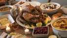 Dining table filled with thanksgiving food