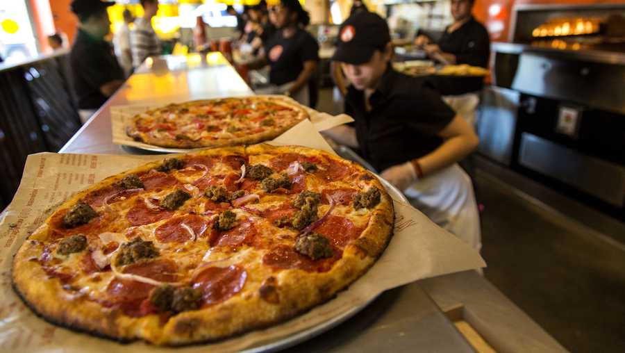 PASADENA, CA - FEBRUARY 21, 2014 - Meat Eater pizza on the counter waiting for pick up during lunch-time at BLAZE PIZZA on East Colorado Blvd, Friday, February 21, 2014. (^^^/Los Angeles Times via Getty Images).  (Photo by Ricardo DeAratanha/Los Angeles Times via Getty Images)
