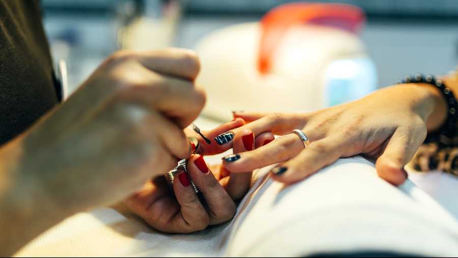 Nail grooming in beauty salon