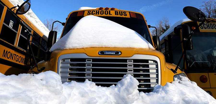 Montgomery County Public School buses remained idle as schools were closed Jan. 25, 2016, in Bethesda, Maryland.