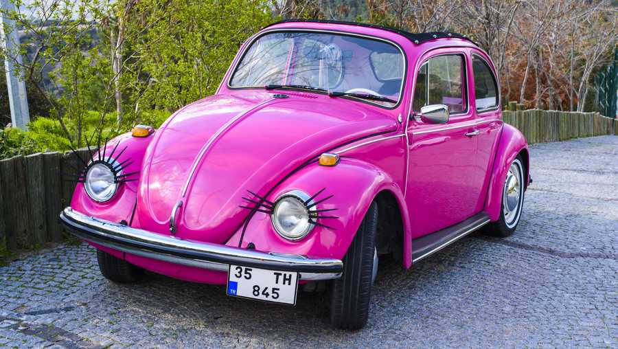 Izmir, Turkey, March 16, 2016: Old fashioned car parked next to the garden in Izmir. The Volkswagen Type 1, widely known as the Volkswagen Beetle, was an economy car produced by the German auto maker Volkswagen (VW) from 1938 until 2003
