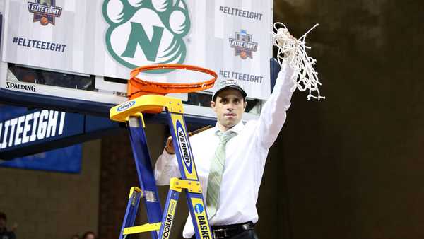 SIOUX FALLS, SD - MARCH 25: Head Coach Ben McCollum from Northwest Missouri State University hoists the net after defeating Fairmont State University 71-61 for the Division II Men's Basketball Championship held at the Sanford Pentagon on March 25, 2017 in Sioux Falls, South Dakota. (Photo by Dave Eggen/NCAA Photos via Getty Images)
