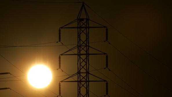 SAN RAFAEL, CA - JULY 24:  Power towers are seen as the sun sets July 24, 2006 in San Rafael, California. The California Independent System Operator declared a stage two power alert for all of California today after available power had fallen to below five percent as high temperatures scorched the state for eight days straight prompting Californians to use a record 50,270 megawatts of power. Temperatures are expected to cool slightly over the next few days but strain on the power grid will continue. A Stage 2 alert means that remaining available power has fallen to below five percent and some businesses will begin to voluntarily shut down some of their operations in exchange for discounted rates. Californians hope to avoid a Stage 3 alert, which would involve rolling blackouts, as calls go out to cut back on power usage until the heat subsides this evening.  (Photo by Justin Sullivan/Getty Images)