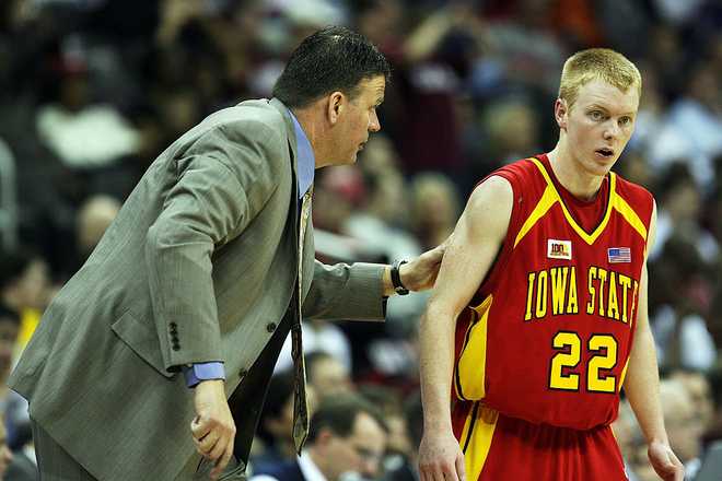 KANSAS&#x20;CITY,&#x20;MO&#x20;-&#x20;MARCH&#x20;13&#x3A;&#x20;&#x20;&#x20;Head&#x20;coach&#x20;Greg&#x20;McDermott&#x20;of&#x20;the&#x20;Iowa&#x20;State&#x20;Cyclones&#x20;talks&#x20;with&#x20;Bryan&#x20;Petersen&#x20;&#x23;22&#x20;during&#x20;the&#x20;game&#x20;against&#x20;the&#x20;Texas&#x20;A&amp;amp&#x3B;M&#x20;Aggies&#x20;on&#x20;day&#x20;1&#x20;of&#x20;the&#x20;Big&#x20;12&#x20;Men&amp;apos&#x3B;s&#x20;Basketball&#x20;Tournament&#x20;on&#x20;March&#x20;13,&#x20;2008&#x20;at&#x20;the&#x20;Sprint&#x20;Center&#x20;in&#x20;Kansas&#x20;City,&#x20;Missouri.&#x20;&#x20;&#x28;Photo&#x20;by&#x20;Jamie&#x20;Squire&#x2F;Getty&#x20;Images&#x29;