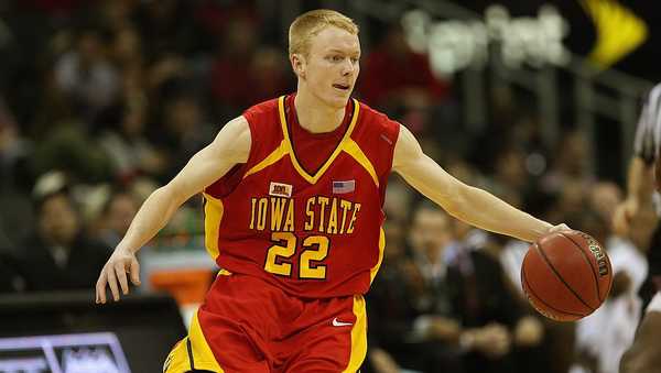 KANSAS CITY, MO - MARCH 13:  Bryan Peterson #22 of the Iowa State Cyclones dribbles against Dominique Kirk #22 of the Texas A&M Aggies during day 1 of the Big 12 Men's Basketball Tournament on March 13, 2008 at the Sprint Center in Kansas City, Missouri. (Photo by Jamie Squire/Getty Images)