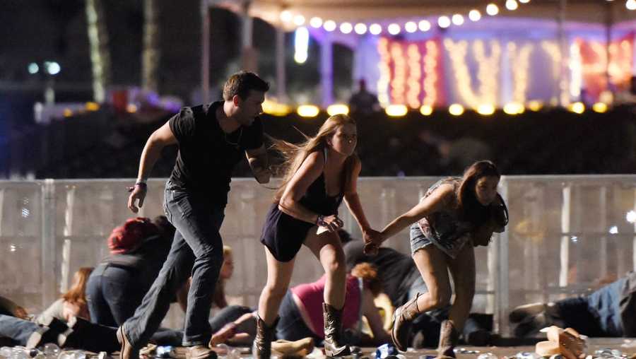 PHOTOS: At least 59 killed, over 500 injured in shooting at Mandalay Bay