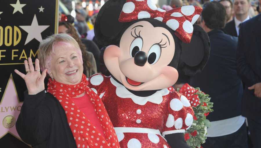 Voice actress Russi Taylor, who voiced Minnie Mouse since 1986, poses with Minnie Mouse during a star ceremony in celebration of the 90th anniversary of Disney's Minnie Mouse at the Hollywood Walk of Fame on Jan. 22, 2018 in Hollywood, California.