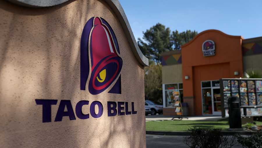 A sign is posted in front of a Taco Bell restaurant on February 22, 2018 in Novato, California.