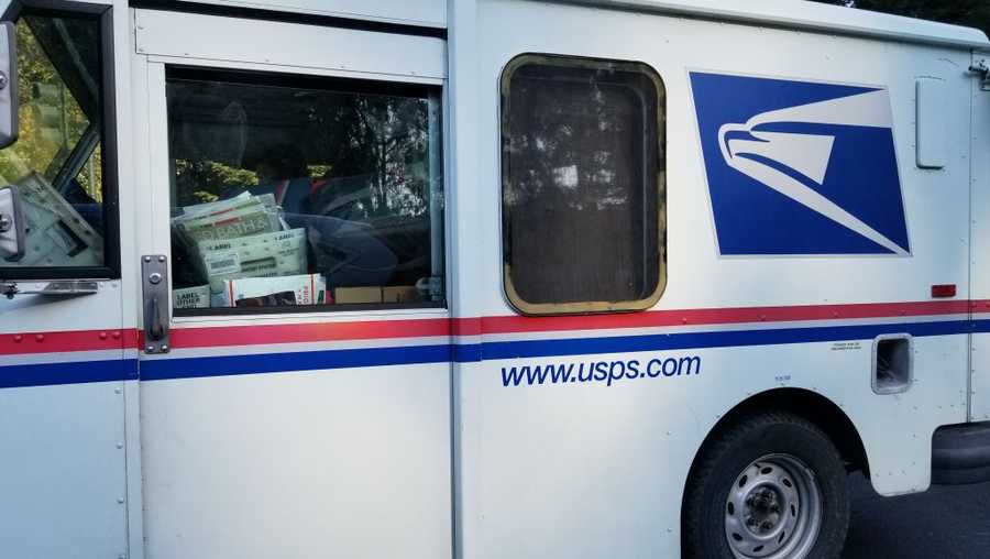 Close-up of the side of a United States Postal Service (USPS) delivery truck delivering mail and packages in San Ramon, California, October 18, 2017. (Photo by Smith Collection/Gado/Getty Images)