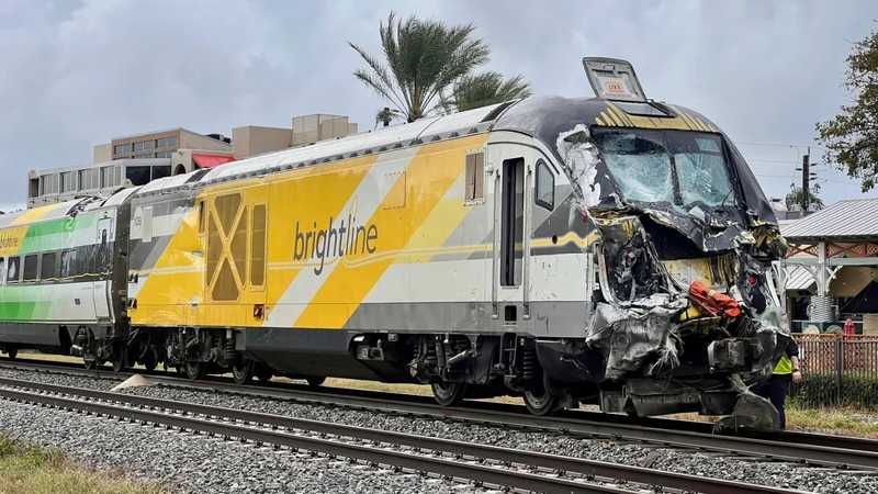 Train collides with fire truck in Florida; police say 3 firefighters and several passengers hurt