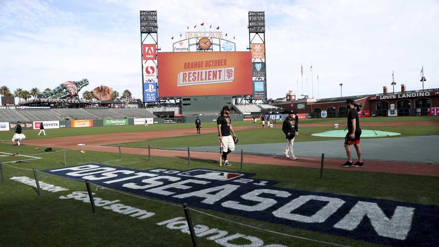 The San Francisco Giants work out Thursday, Oct. 7, 2021, in San Francisco for the baseball team's National League Division Series against the Los Angeles Dodgers, which starts Friday. (AP Photo/Jed Jacobsohn)
