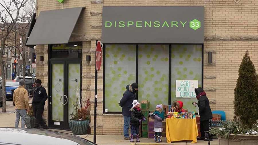 Girl Scouts selling cookies outside of Dispensary 33 in Chicago.