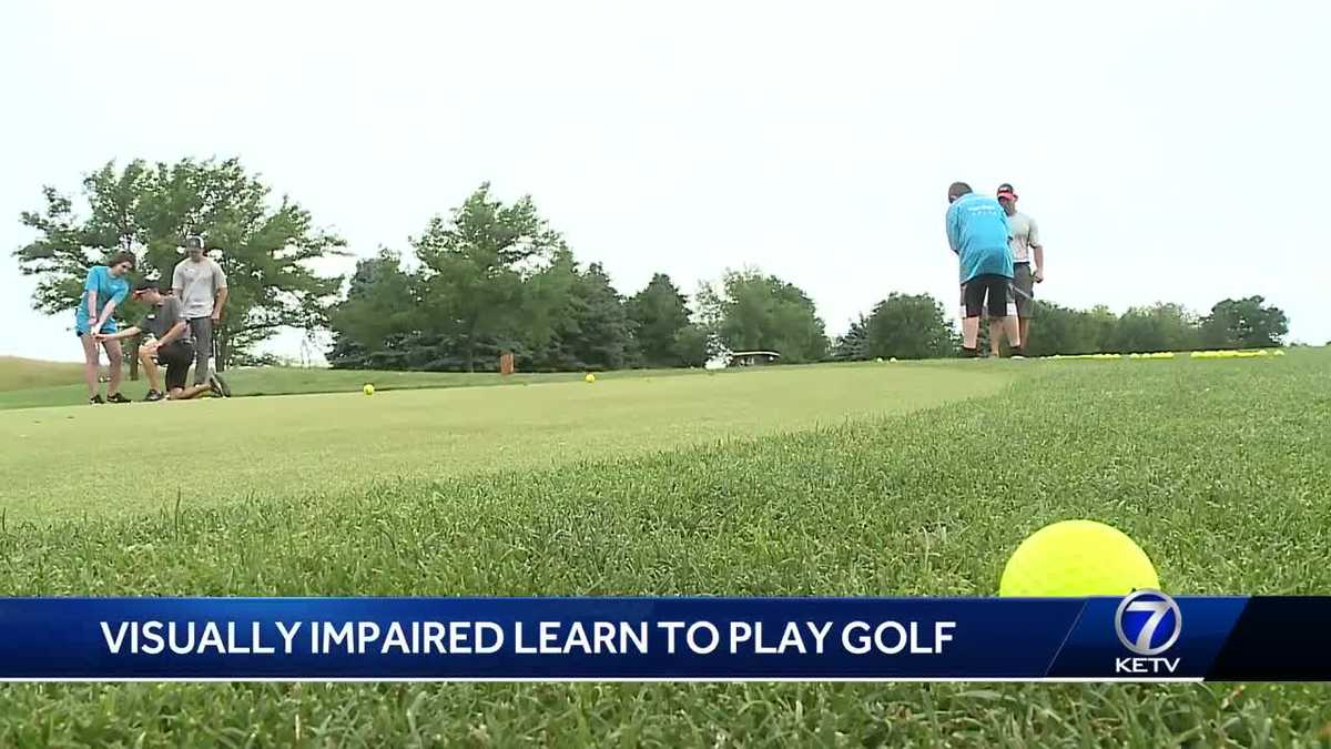 Visually impaired learn to play golf
