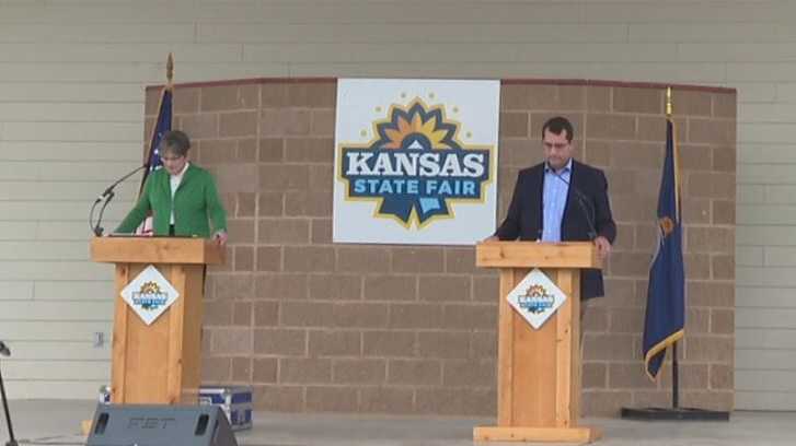 Gov. Laura Kelly and Derek Schmidt debate at the Kansas State Fair