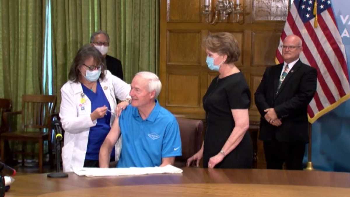 Arkansas governor gets COVID19 booster shot, loosens quarantines
