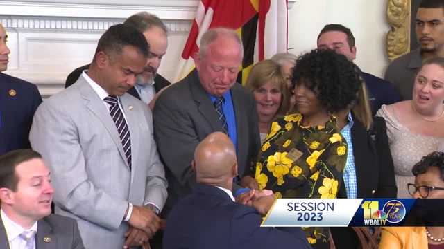Personal, emotional moments underscore Moore's first bill signing - Vimarsana News