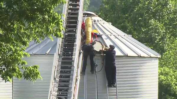 Man trapped to neck in wet soybeans rescued from grain bin