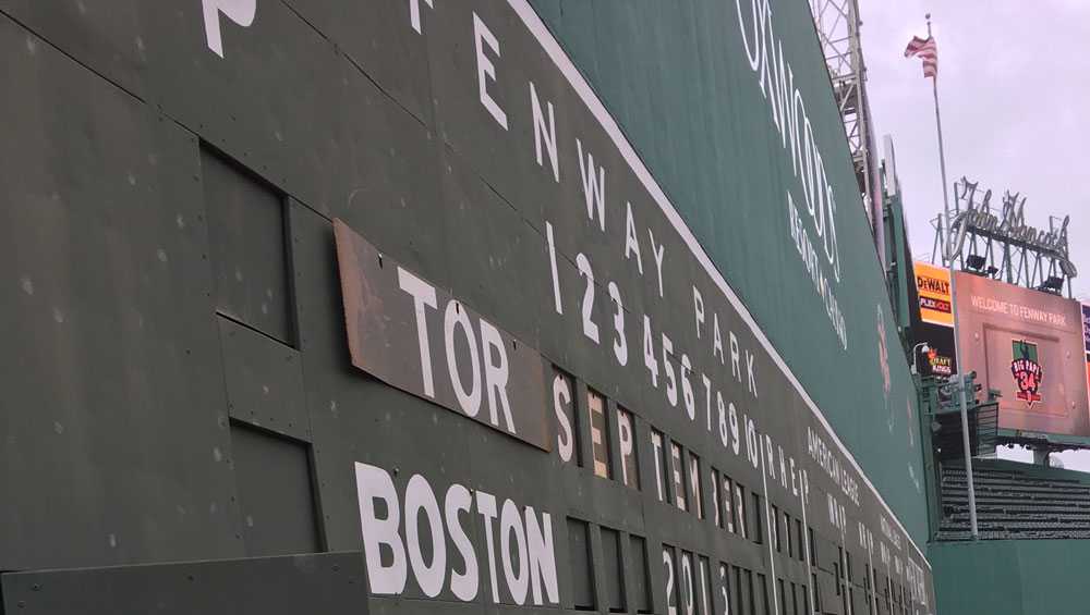 At the foot of Fenway's Green Monster there is a door. Let's go