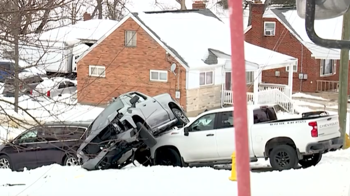 Green Township family reeling after truck lands on their cars, takes out power lines