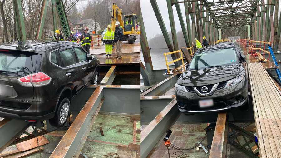 greenfield massachusetts car drives on bridge under construction