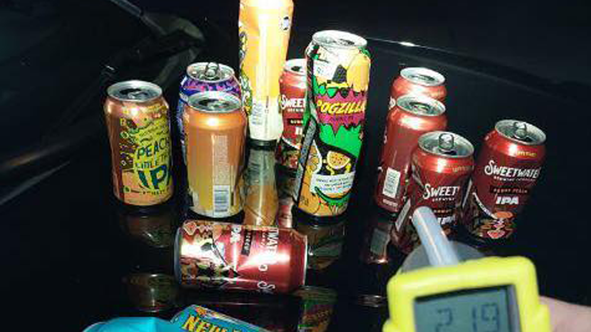 Troopers arrest drunk driver after finding over a dozen opened containers in vehicle
