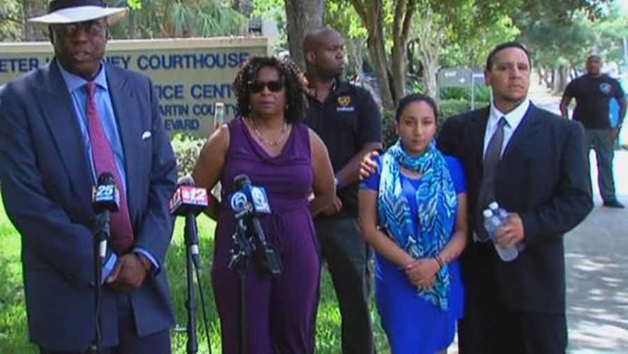 'Jasmine,' also known as Celeste Guap stands next to her attorney. 