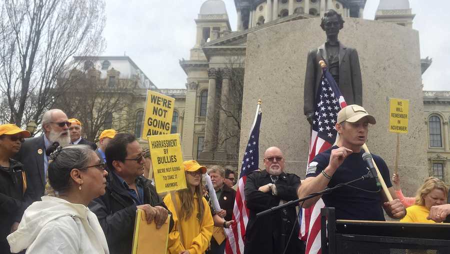 Libertarian candidate for governor Grayson "Kash" Jackson of Antioch tells a crowd of gun-rights advocates he will fight for the "freedom to protect ourselves against a tyrannical government" Wednesday, April 25, 2018, in Springfield. 